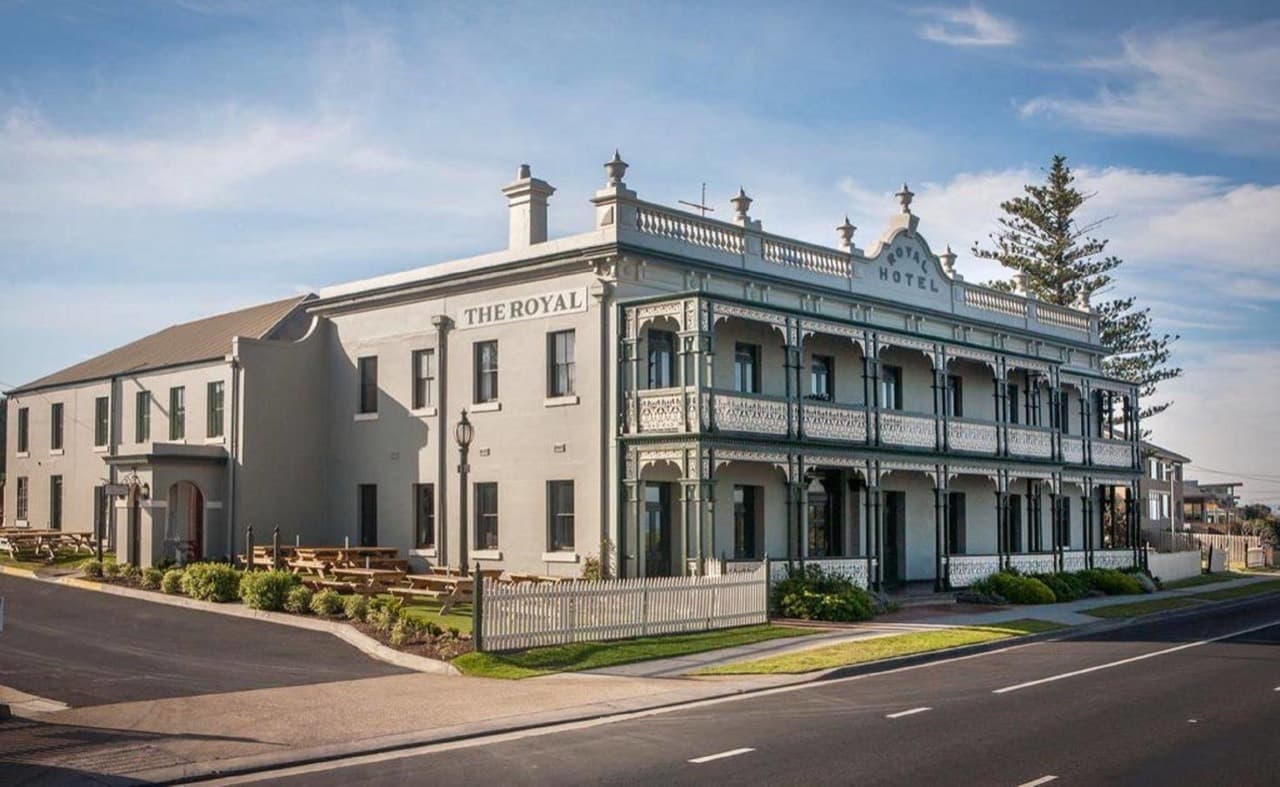 The Royal Hotel Mornington with its ornate balconies and white picket fence