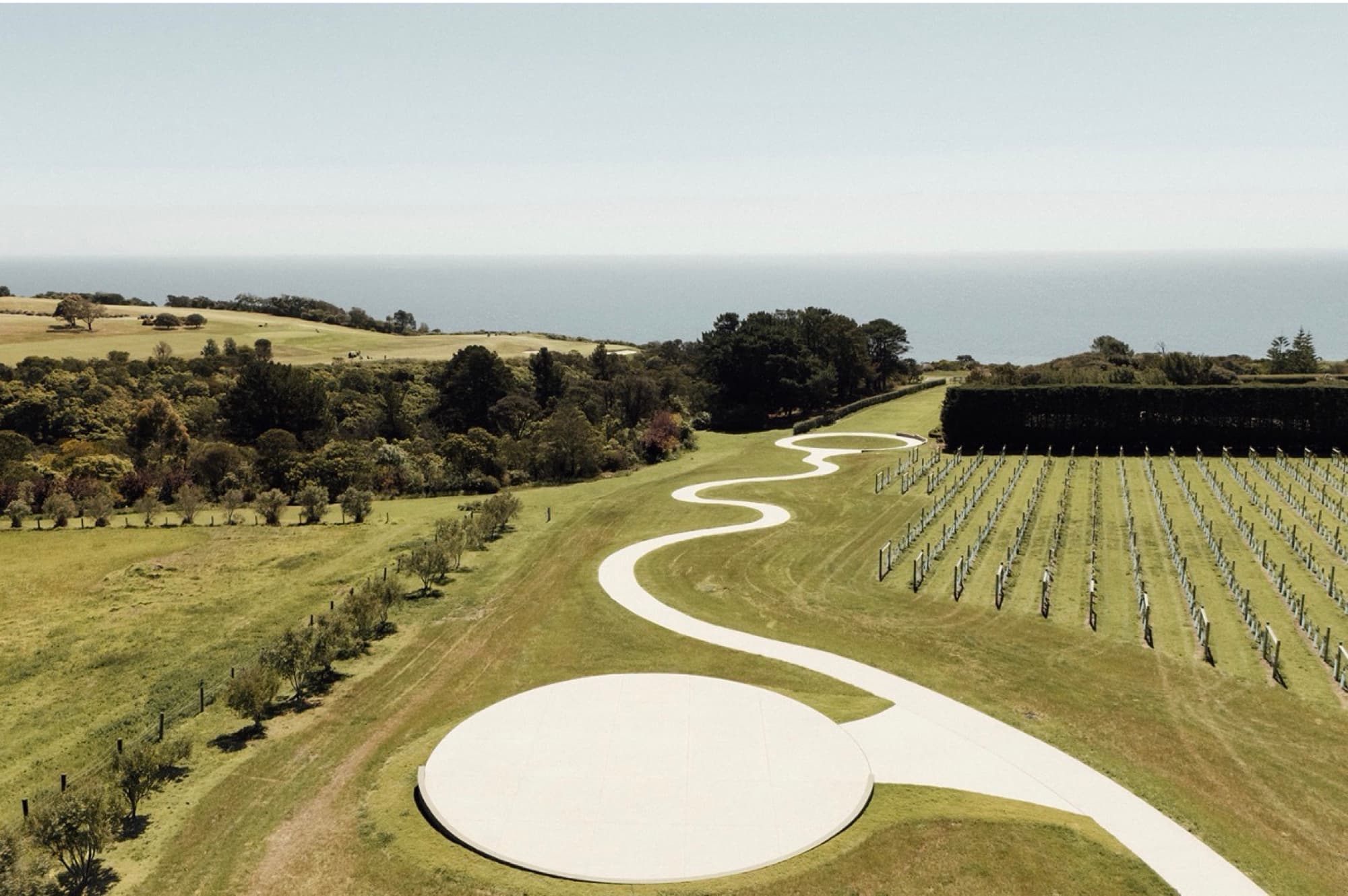 Aerial view of Sunnyside Estate — the ceremony circles and winding path above Port Phillip Bay
